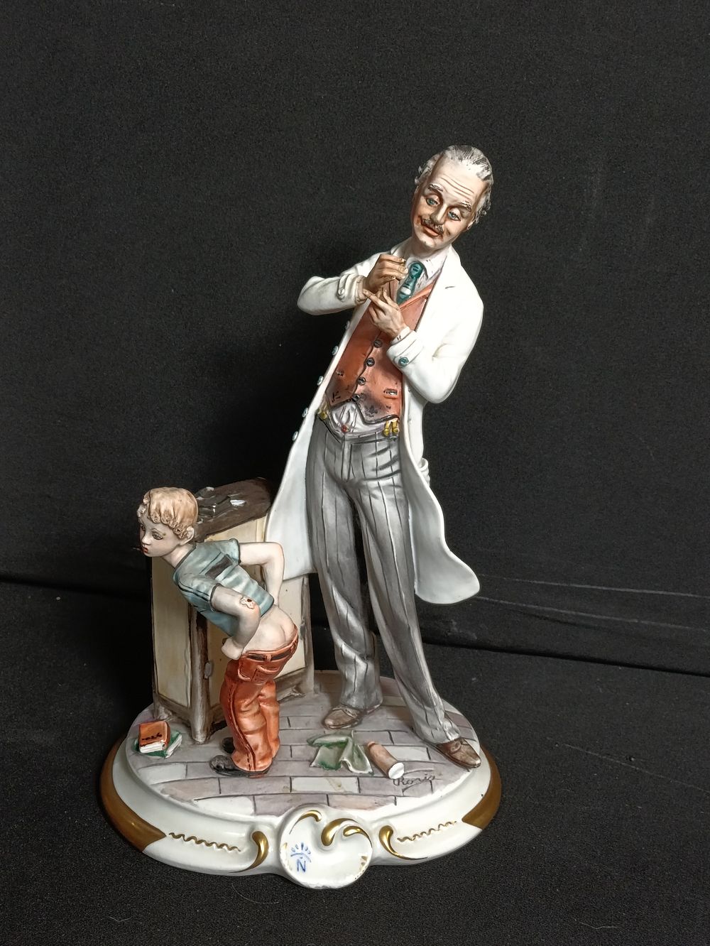 Lot 392: Limited edition Capodimonte porcelain figurine, approximately 26cm tall.