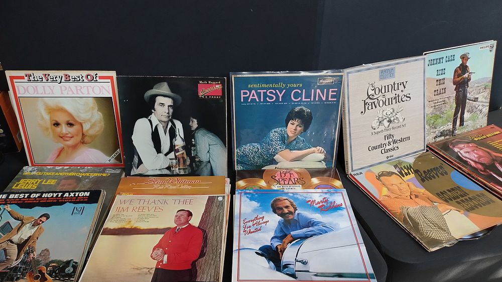 Lot 398: 50 country LP's and 3x album box sets...
