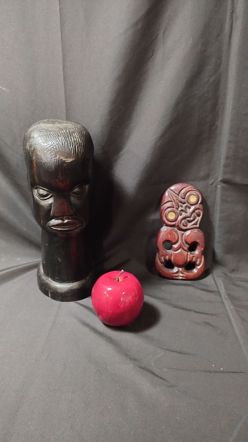 Lot 444: A maori tiki wooden carved figure abalone eyes....