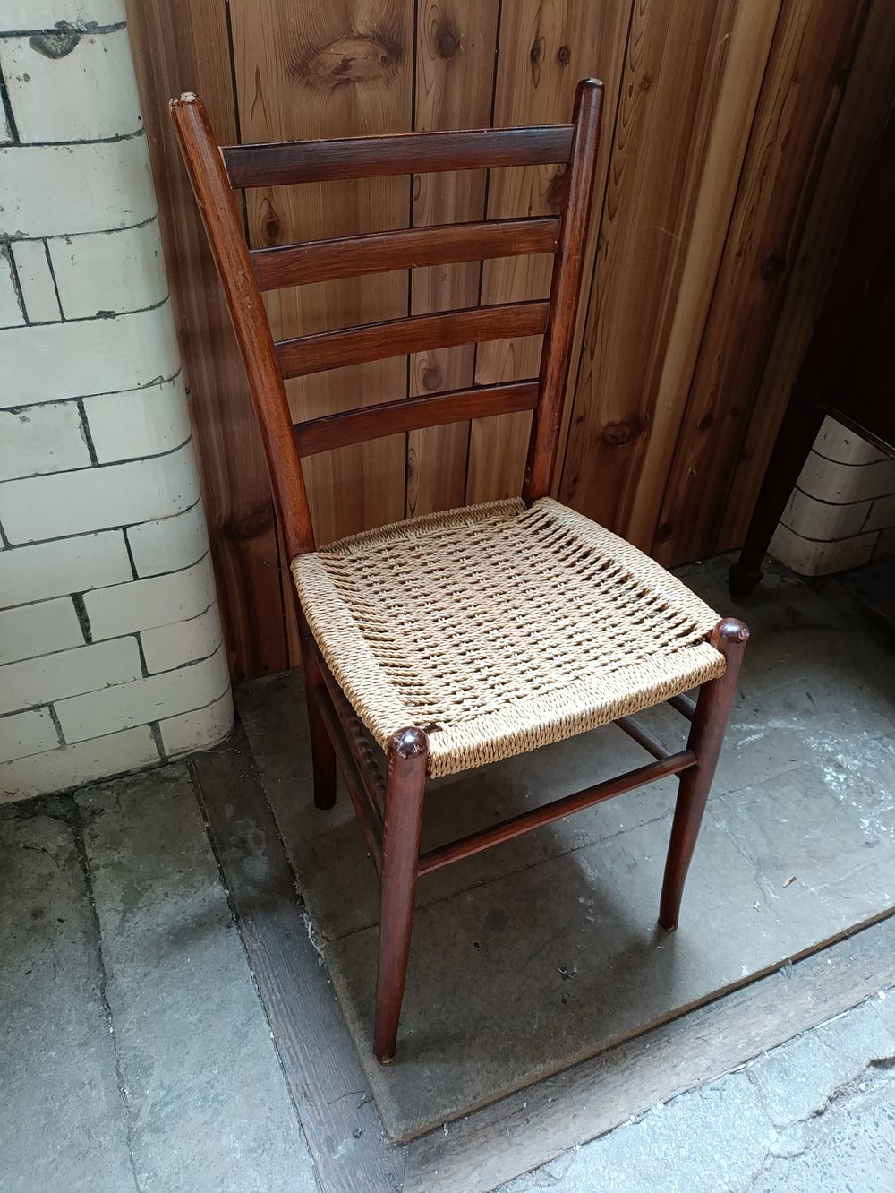 Lot 377: Vintage ladder back wooden chair with rope woven...