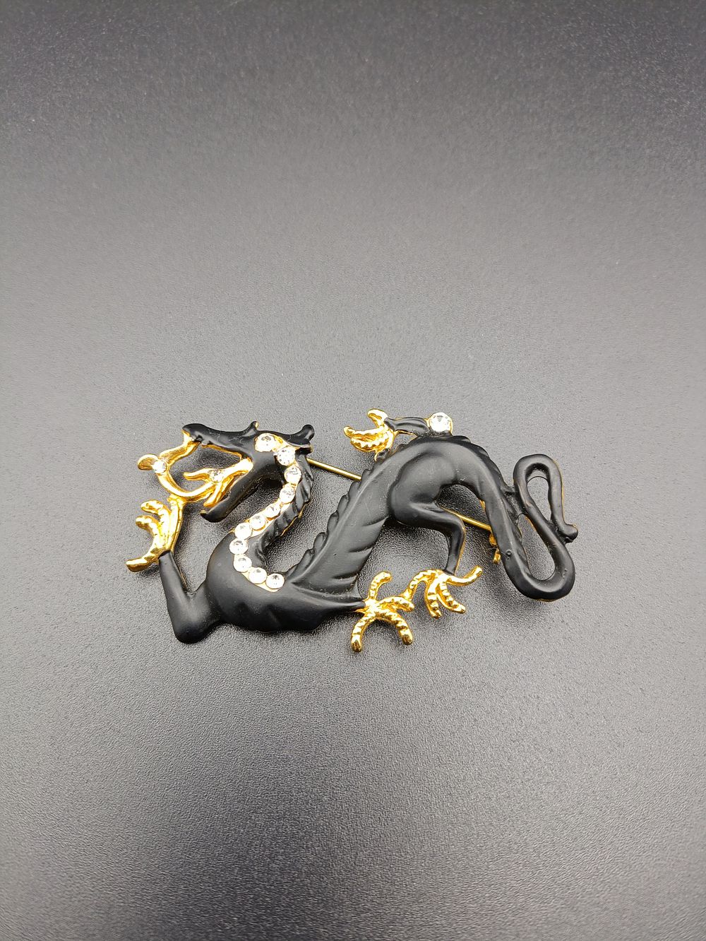 Lot 454: Beautiful Swarovski dragon brooch. In matt black with...