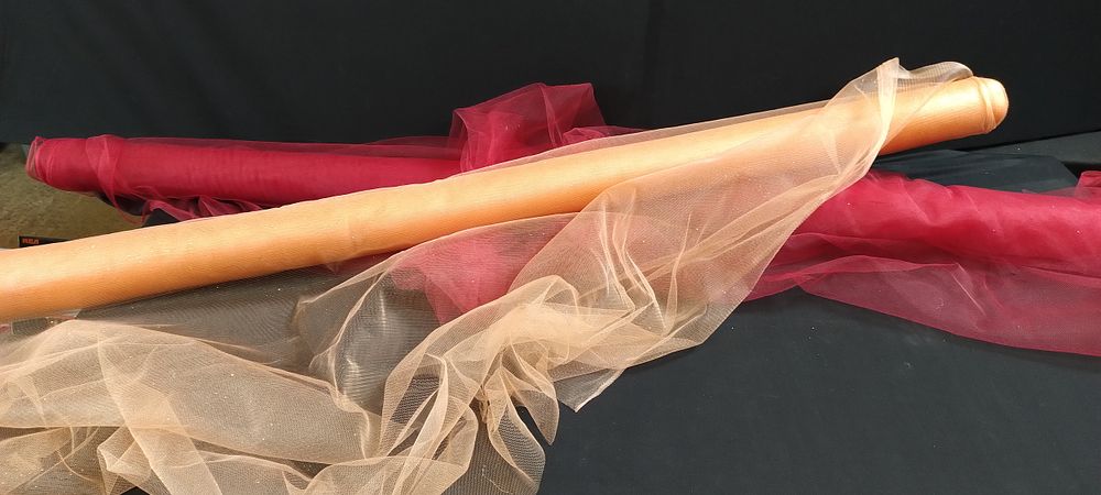Lot 465: 2 rolls of glitterey mesh tulle material, Red...