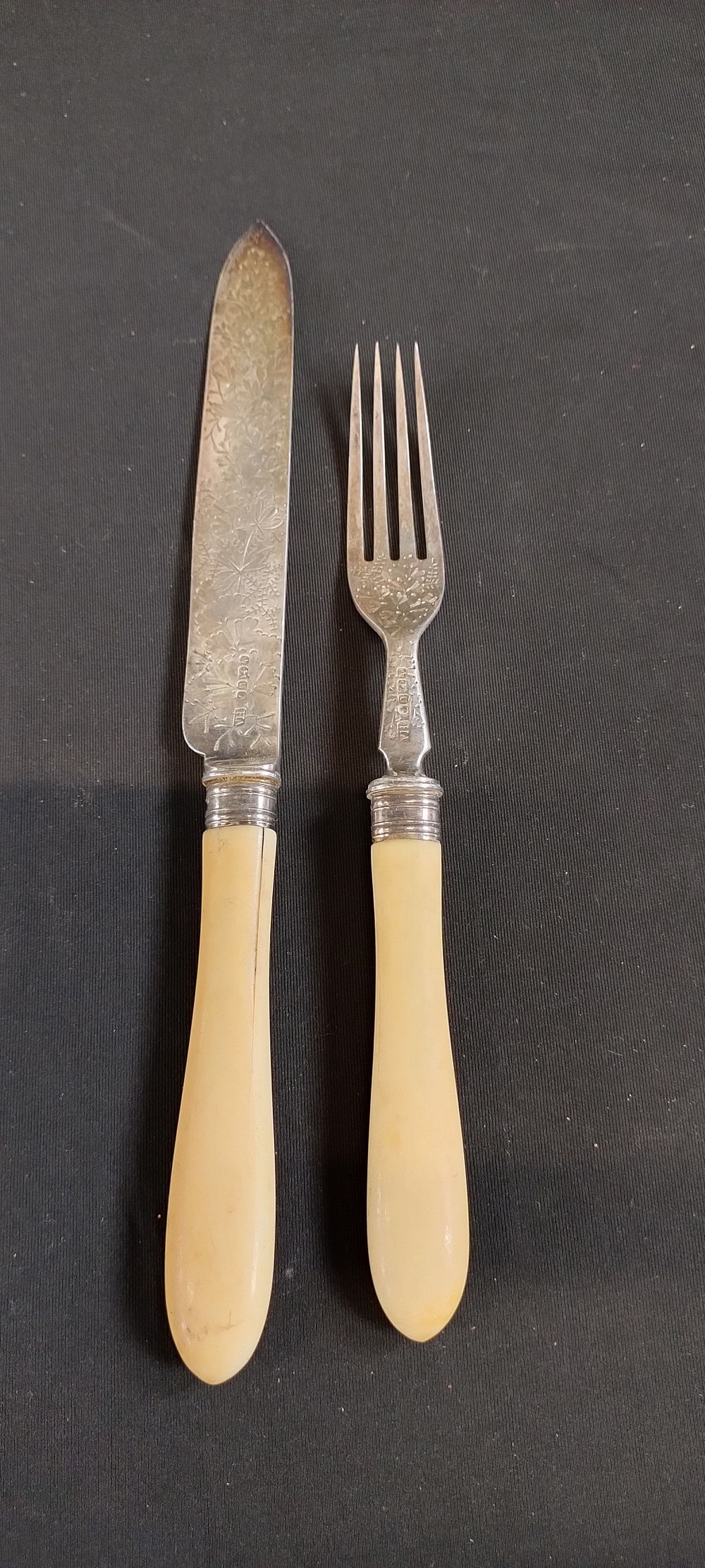 Lot 472: Sterling silver 1823 knife and fork with bone...