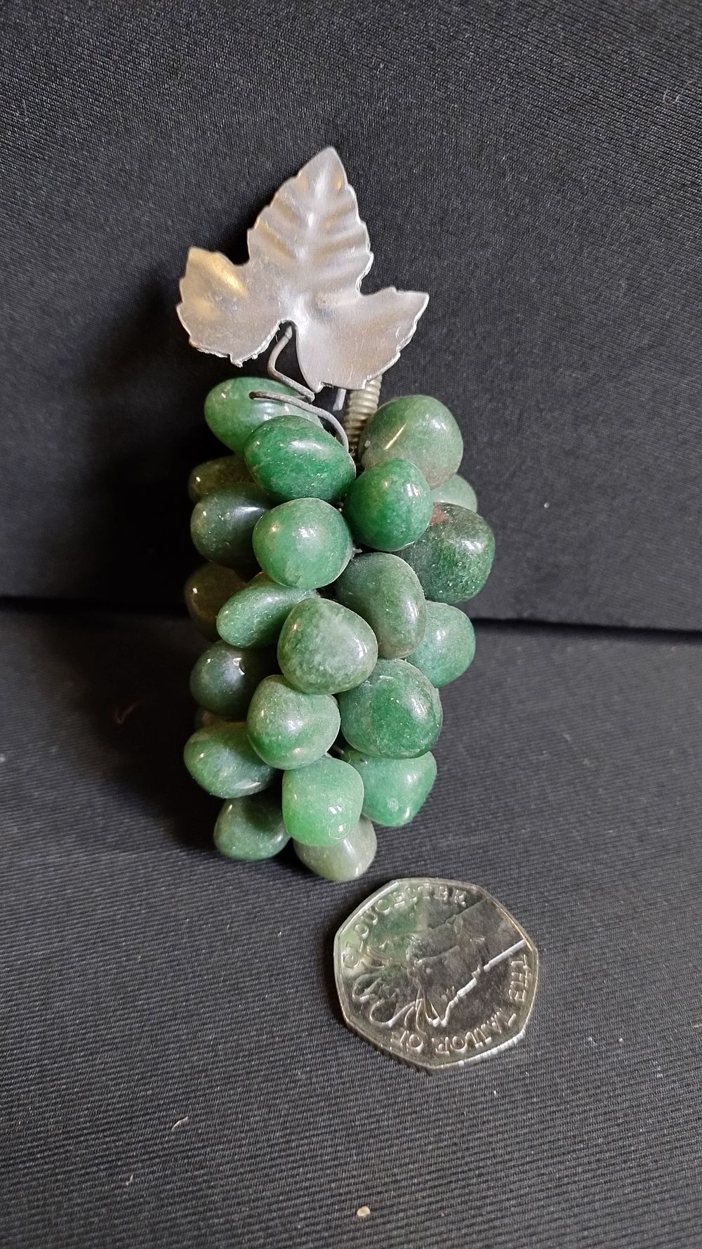 Lot 480: Bunch of Green jade grapes with decorative leaf....