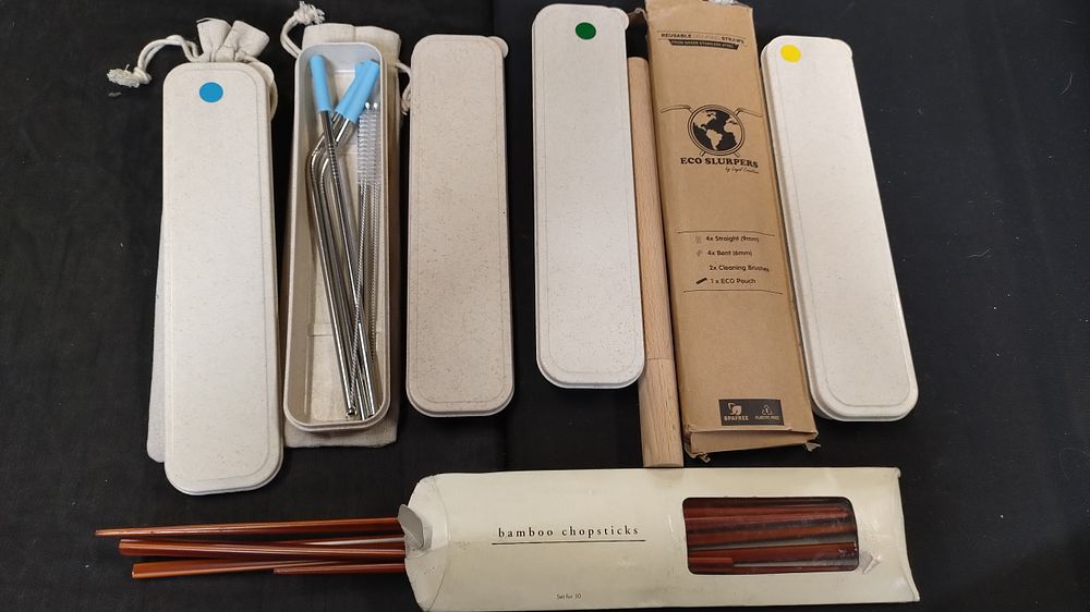 Lot 481: 5 sets of metal reusable straws and cleaning...