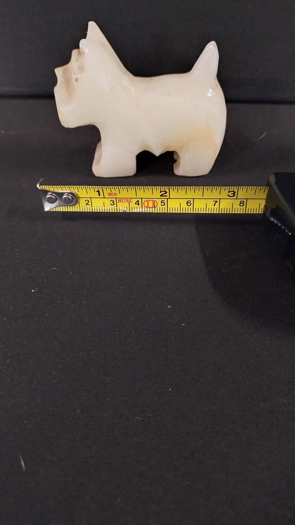 Lot 484: White Quartz Scotty dog measures 6 x 7...