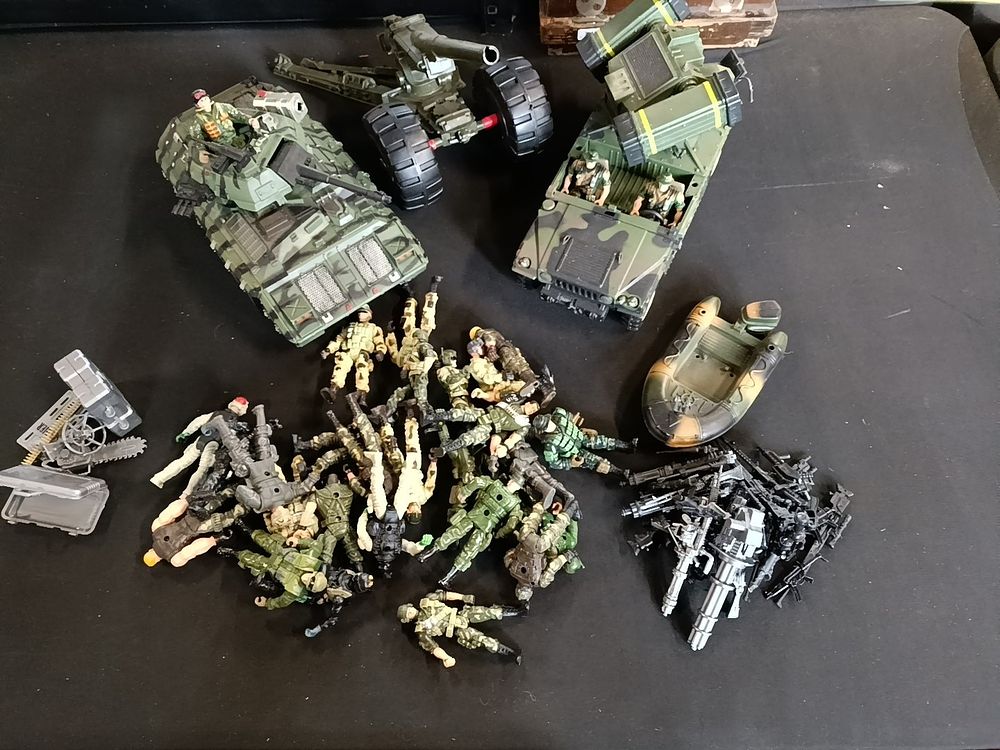 Lot 503: Military themed toys including a tank, humvee, lots...