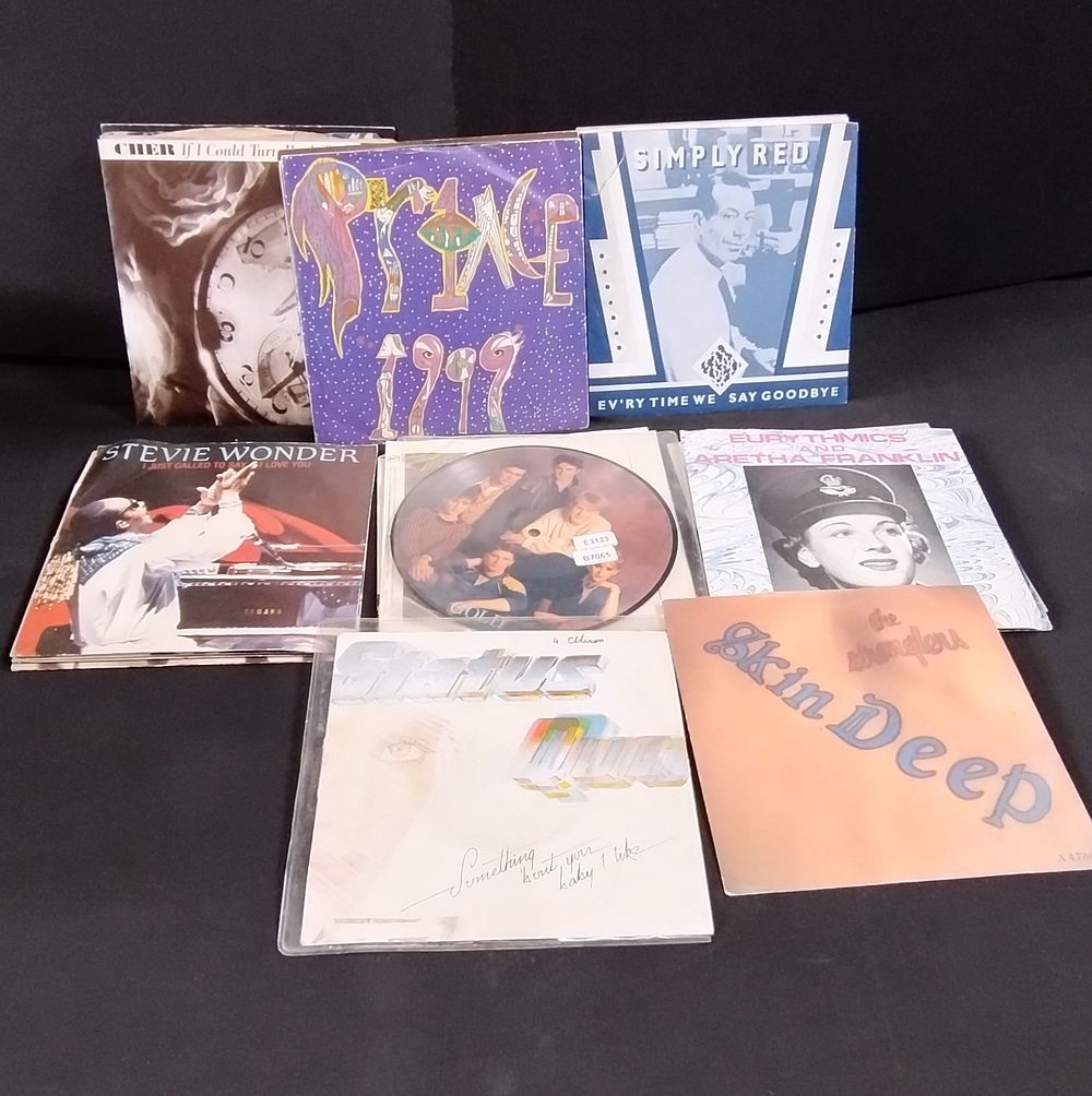 Lot 203: 25 singles various artists and genres including picture...