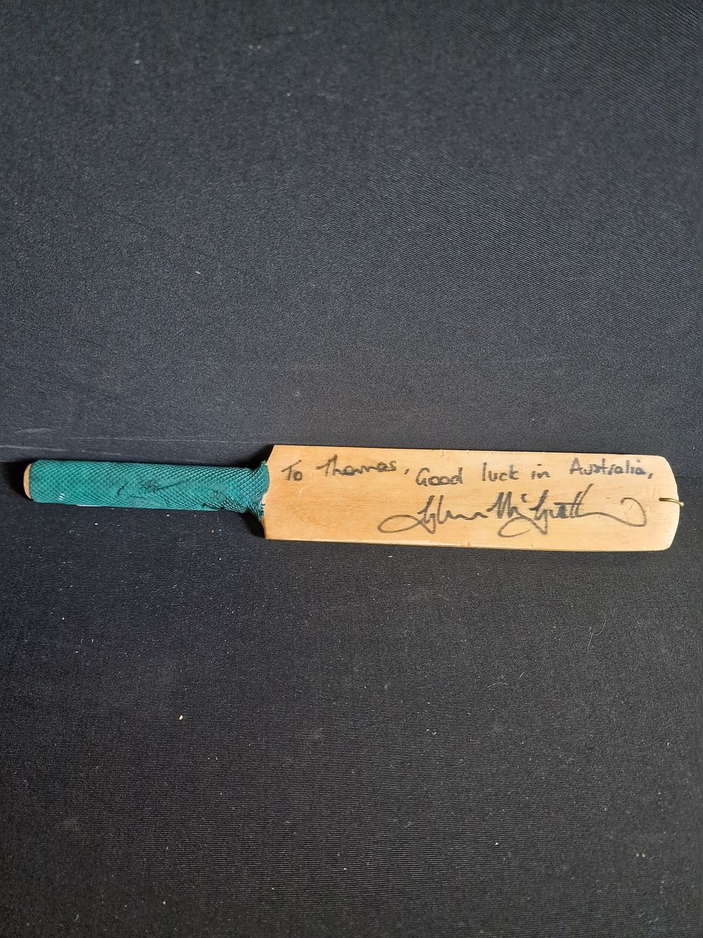Lot 211: Souvenir Cricket Bat Signed by Australian Cricketer Glenn McGrath. Approx 305mm Length