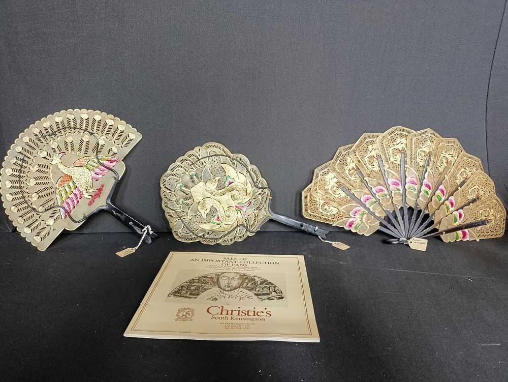 Lot 216: Three Vintage Bull Hide Fans From Bali along...