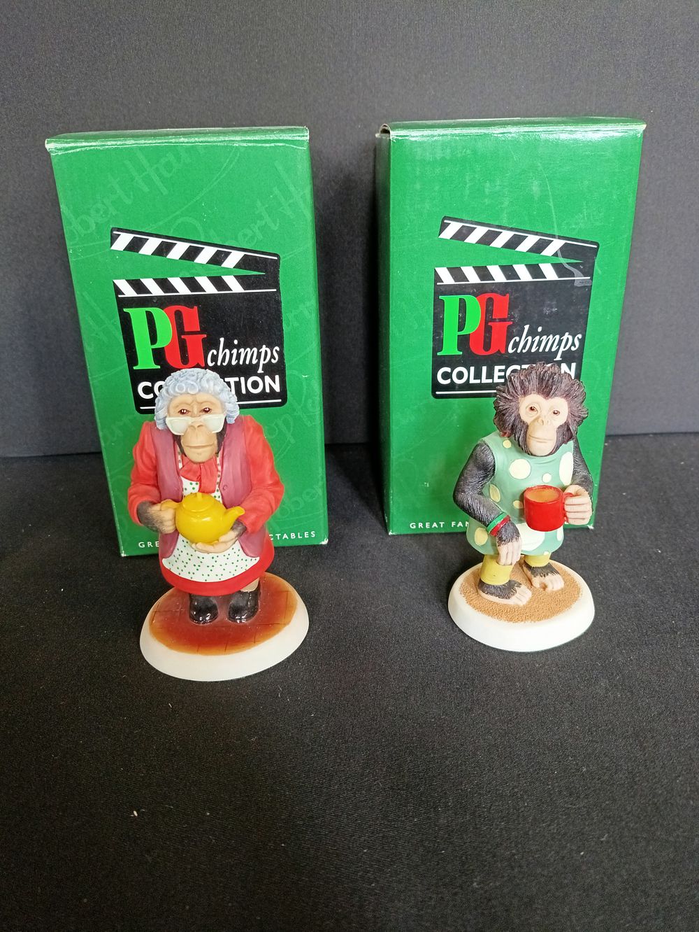 Lot 226: Two boxed collectable figurines from the PG Chimps...
