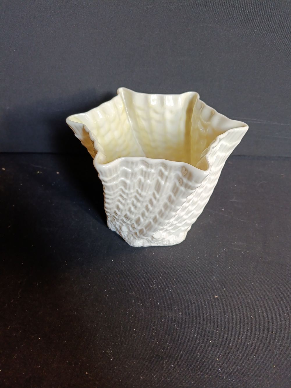 Lot 238: Belleek Irish Limpet Hexagonal Twist Swirled Vase approximately...