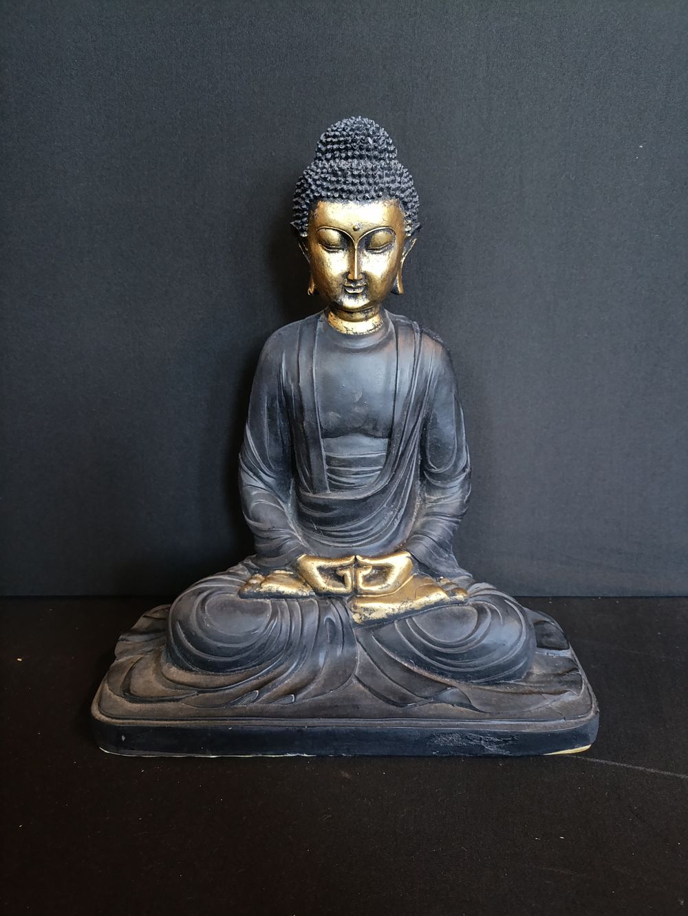Lot 259: Light resin black and gold Buddha approximately 30cm...