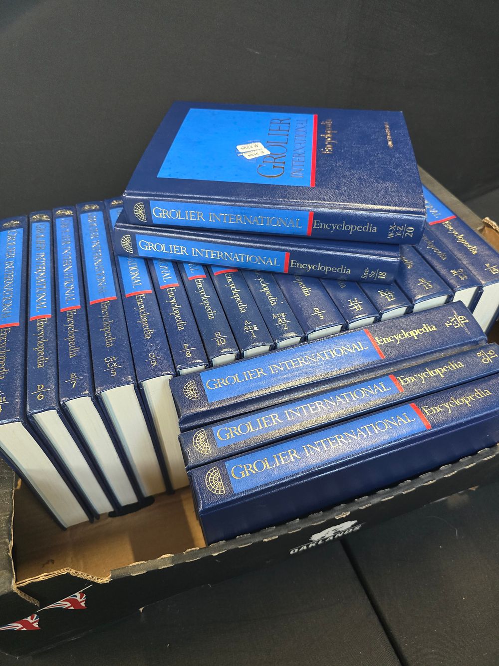 Lot 56: A full collection of Groloer International Encyclopedias. Excellent...