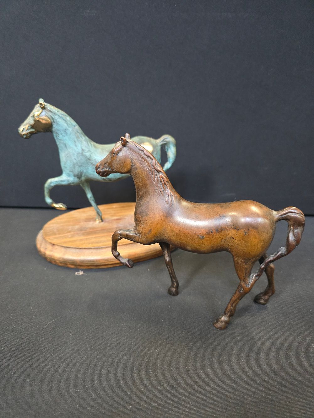 Lot 57: Two vintage stallion horse in prancing pose. One...