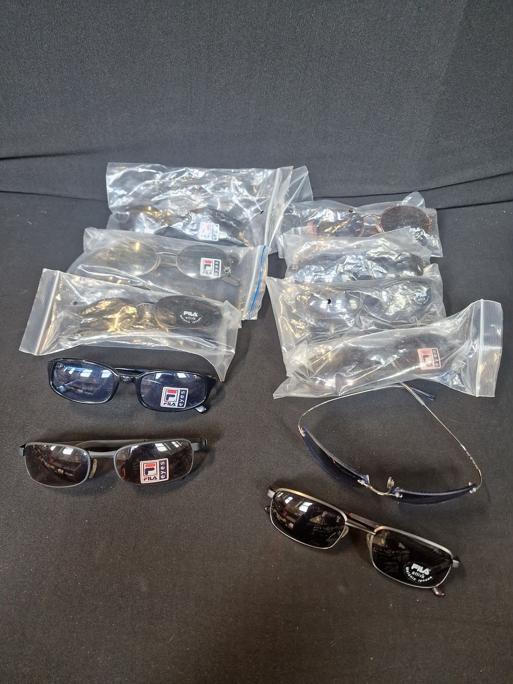 Lot 86: 11 Pairs of Fila Sunglasses