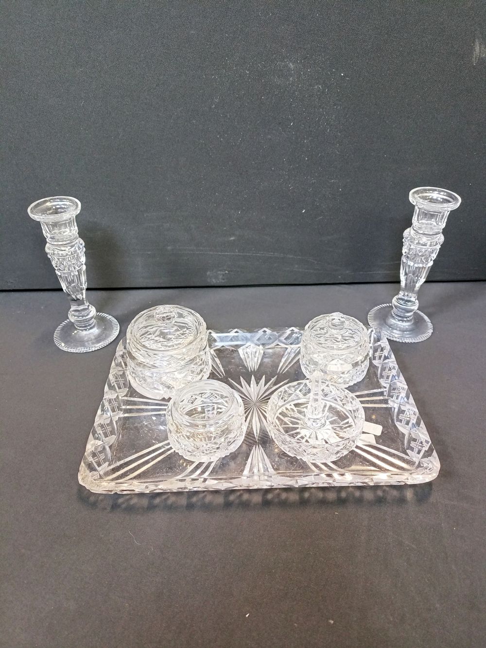 Lot 127: Art deco clear glass vanity set including tray,...