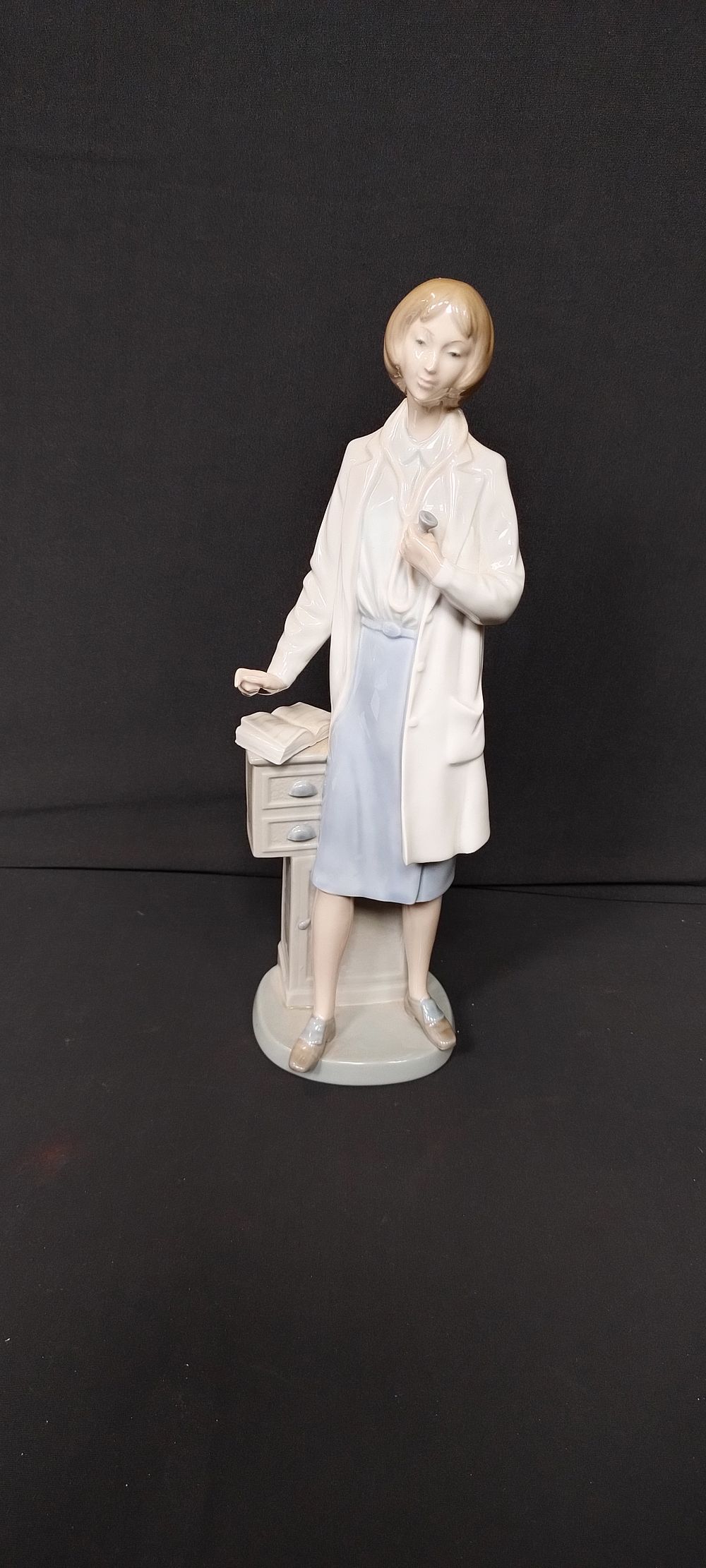Lot 137: No by lladro figurine of a female doctor...