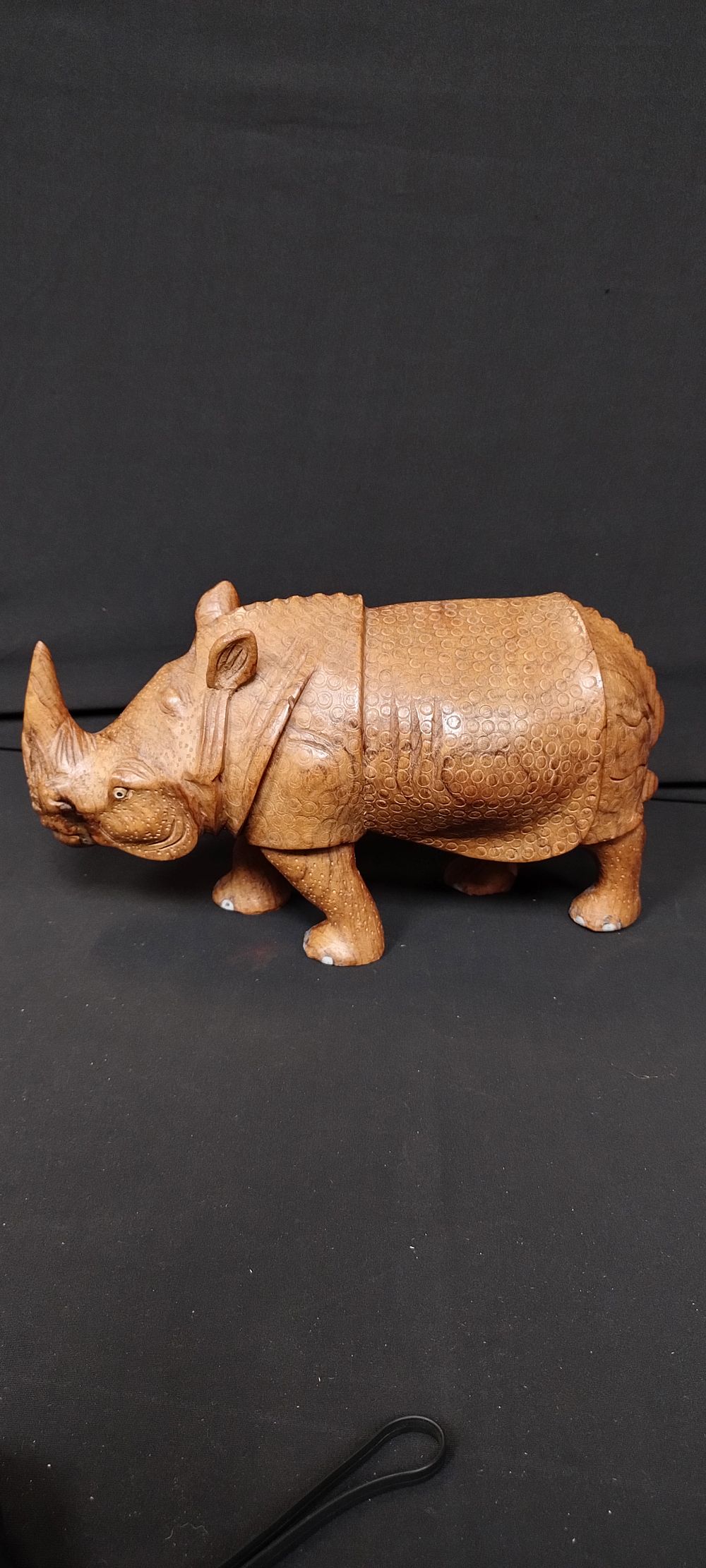 Lot 142: Beautiful Solid wood carved rhino Measures approx H...