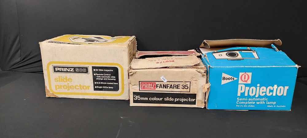 Lot 219: 3 vintage slide projectors, Prinz 500, Prinz Fanfare...