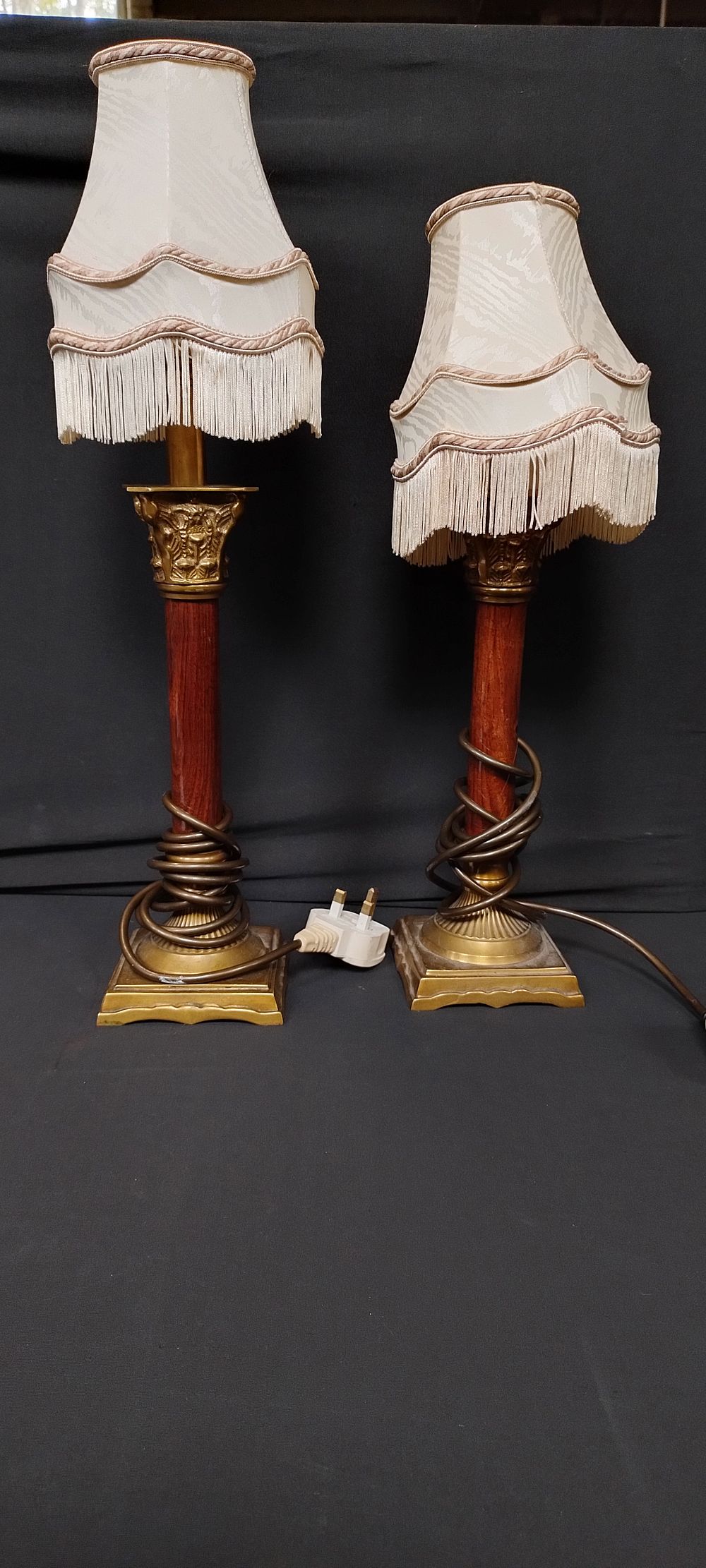Lot 251: Two cast metal and wood table lamps tested...