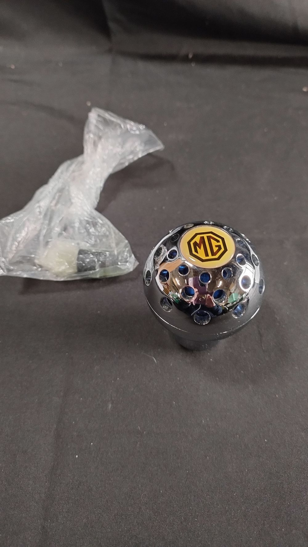 Lot 262: Chrome MG gear Stick top with fixings