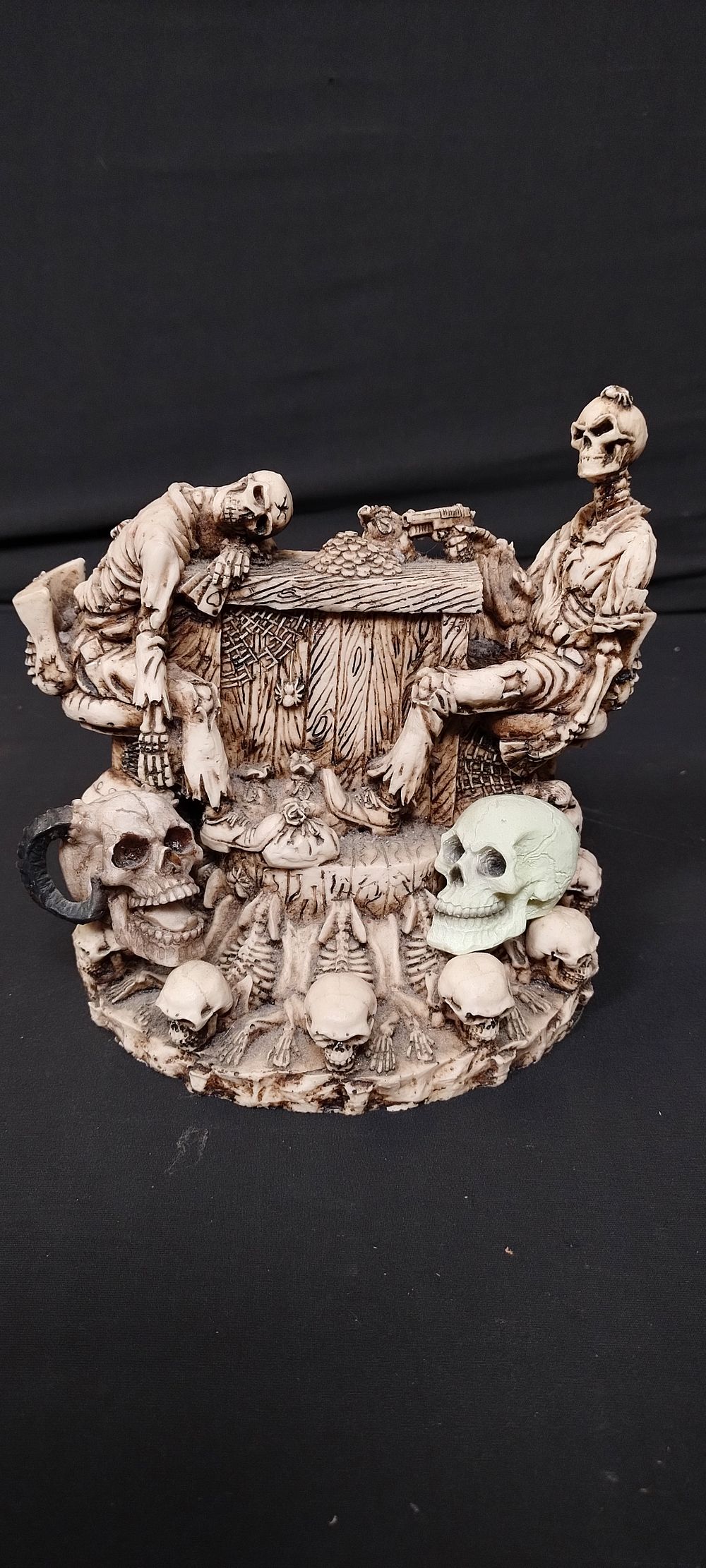 Lot 275: Resin sculpture of 2 skeletons sat at a...
