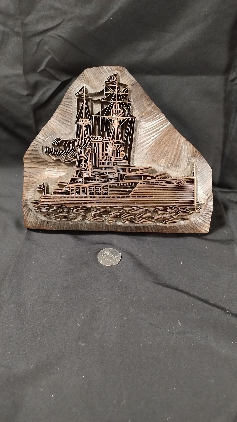 Lot 337: Hand made Impressed copper boat on solid wood...