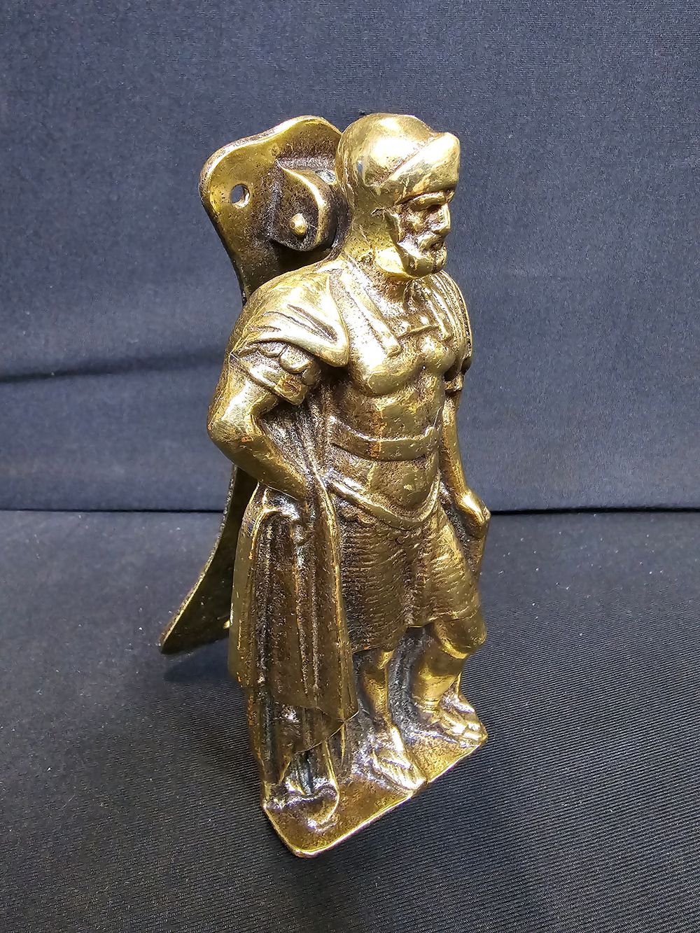 Lot 344: A brass Knight door knocker