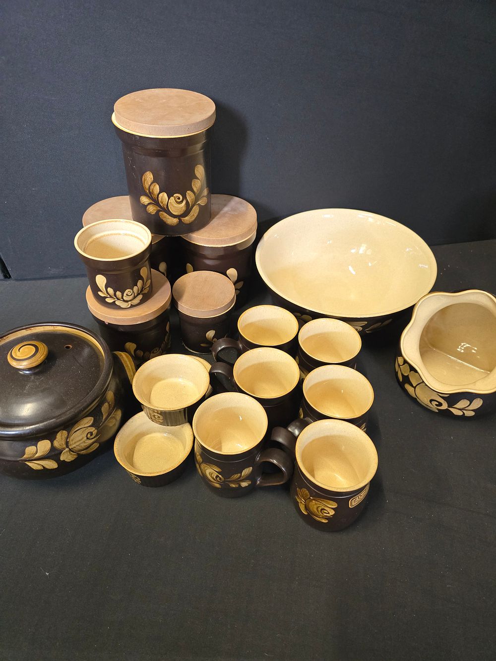 Lot 382: A selection of DENBY bakewell ware. Includes mugs,...