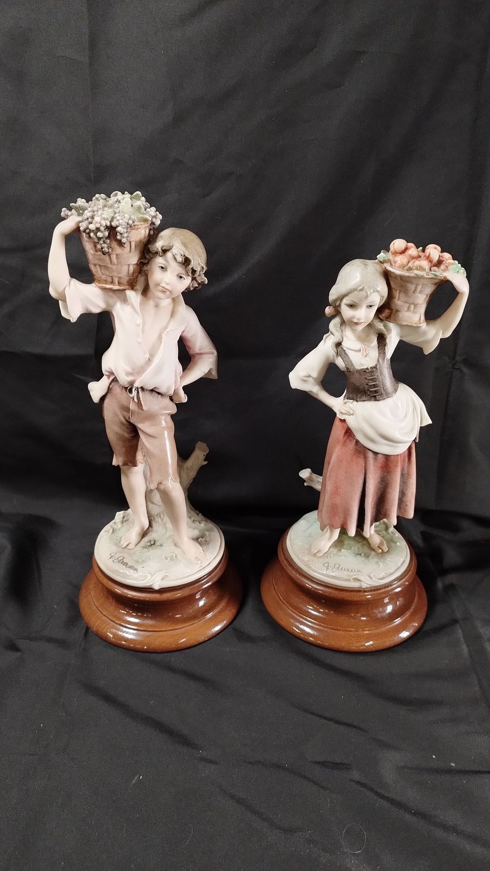 Lot 400: 2 capodimonte figurines, boy with grapes measures approx...