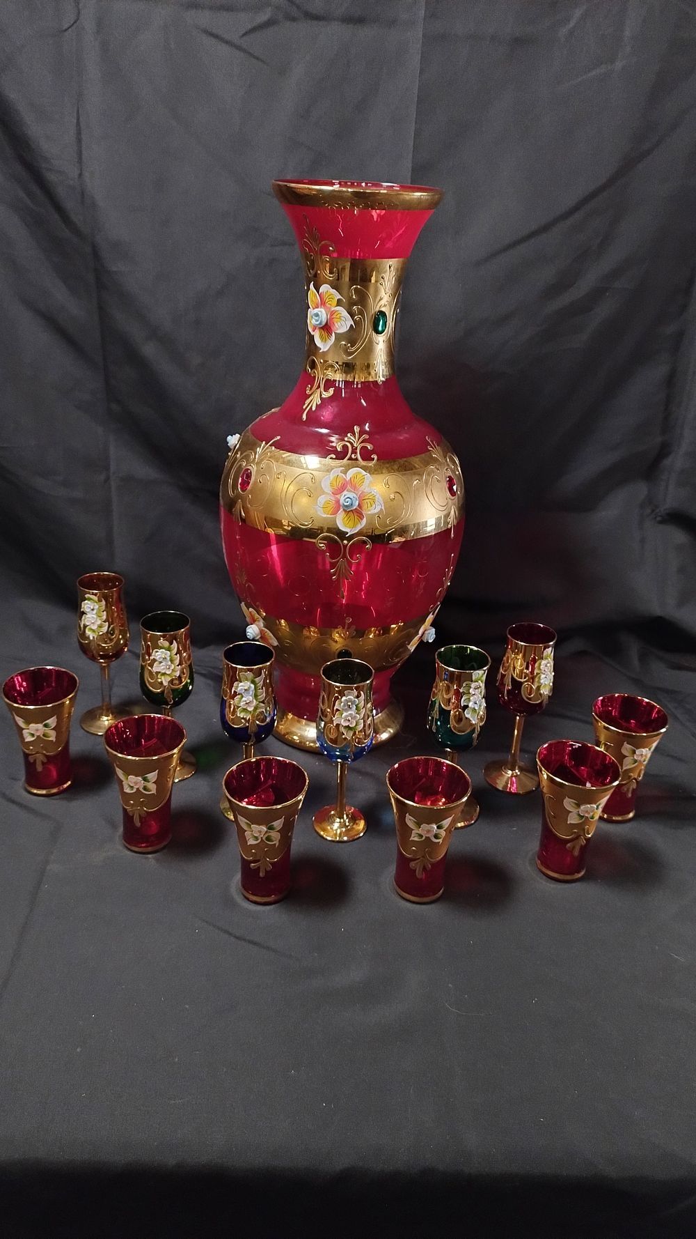 Lot 409: Large red bohemian glass vase measures approx H...