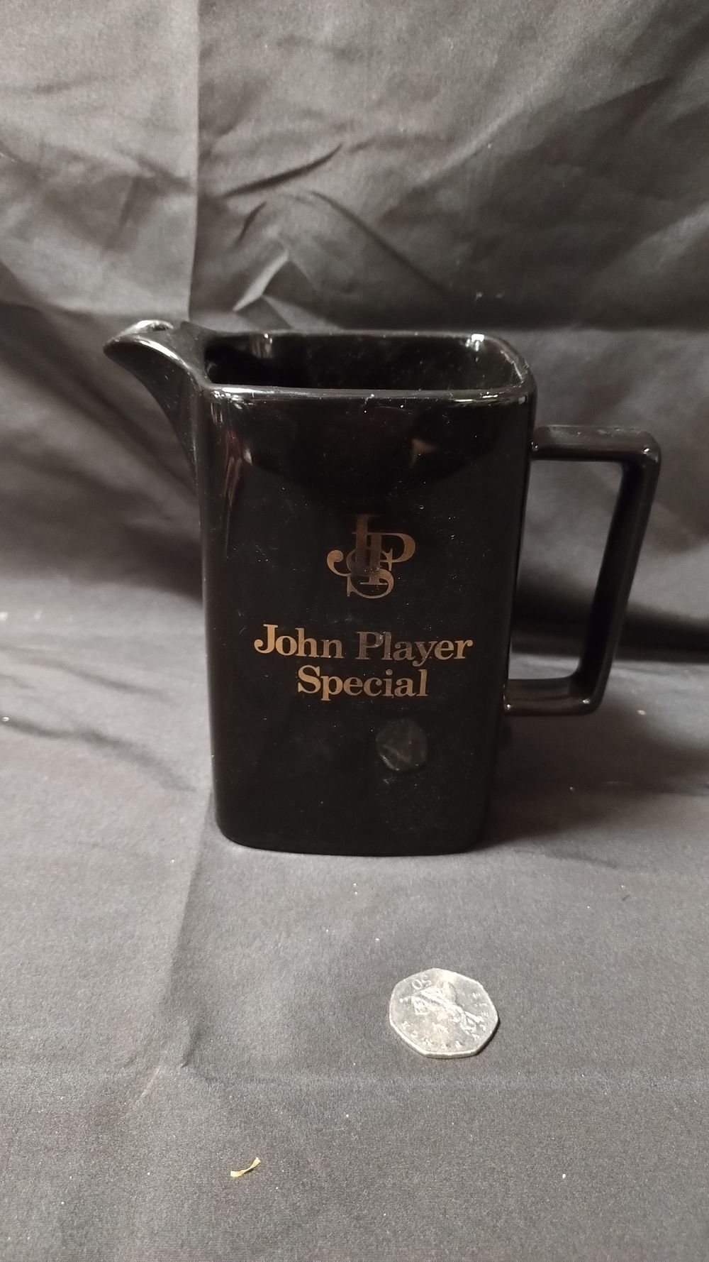 Lot 418: John Player Special whiskey/ brandy water jug