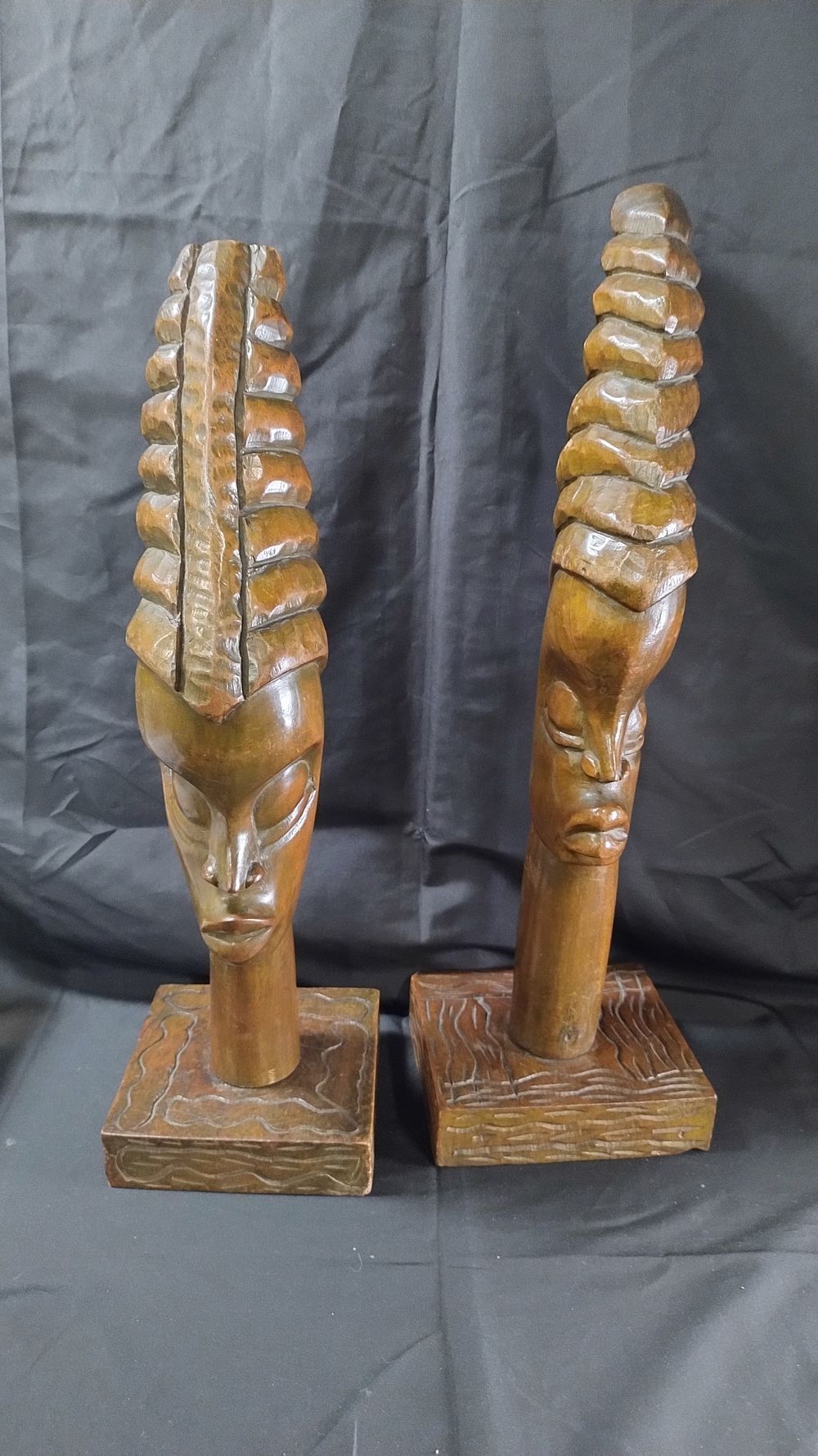 Lot 423: 2 wooden Africana figure heads measures approx H...