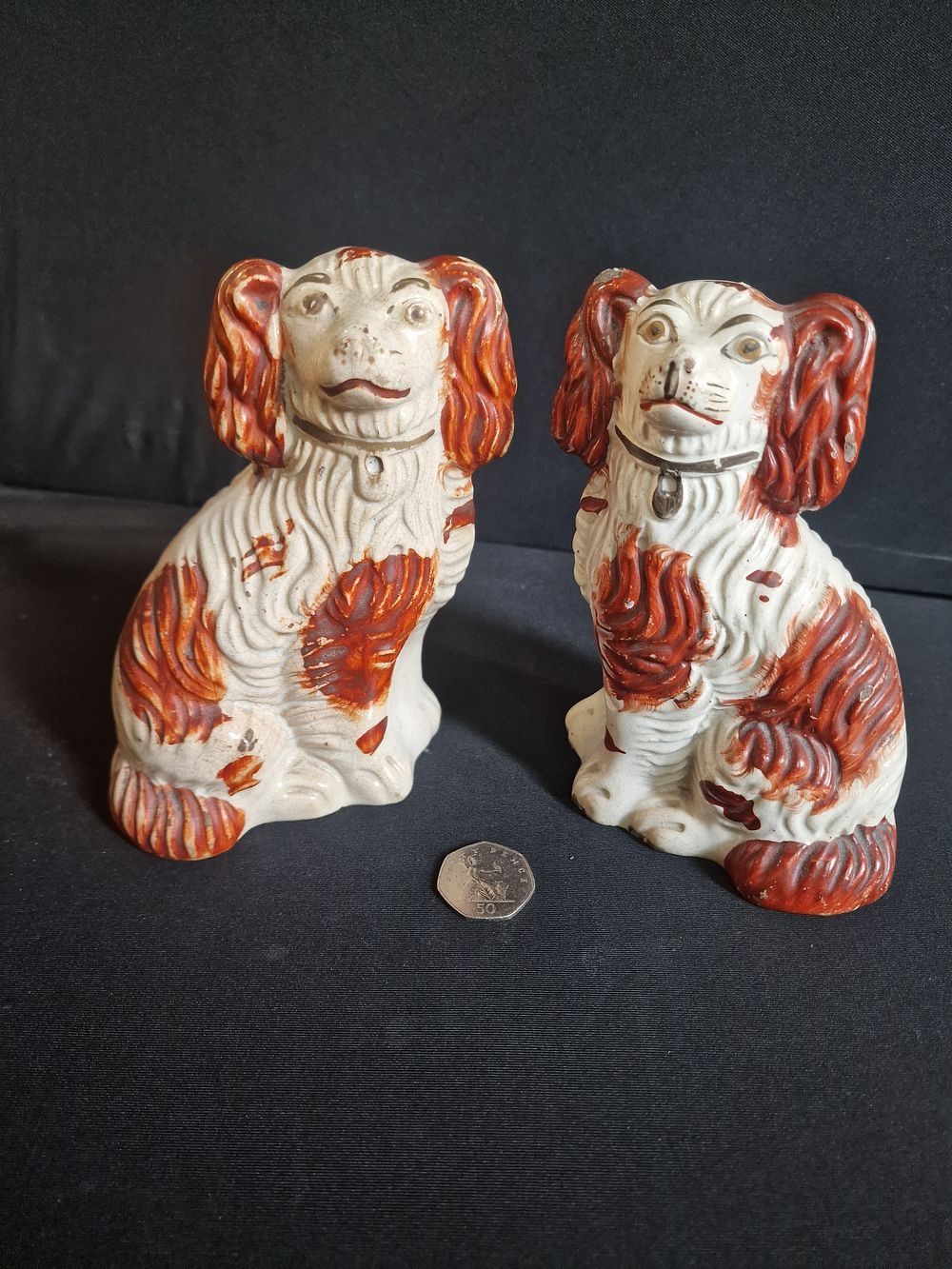 Lot 432: A pair of Staffordshire pottery Dogs Height 16cm