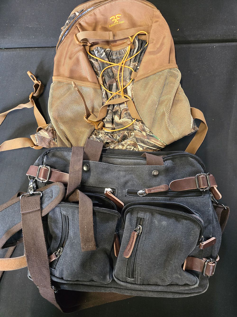 Lot 458: Two holdall and ruck sack bags. Includes a...