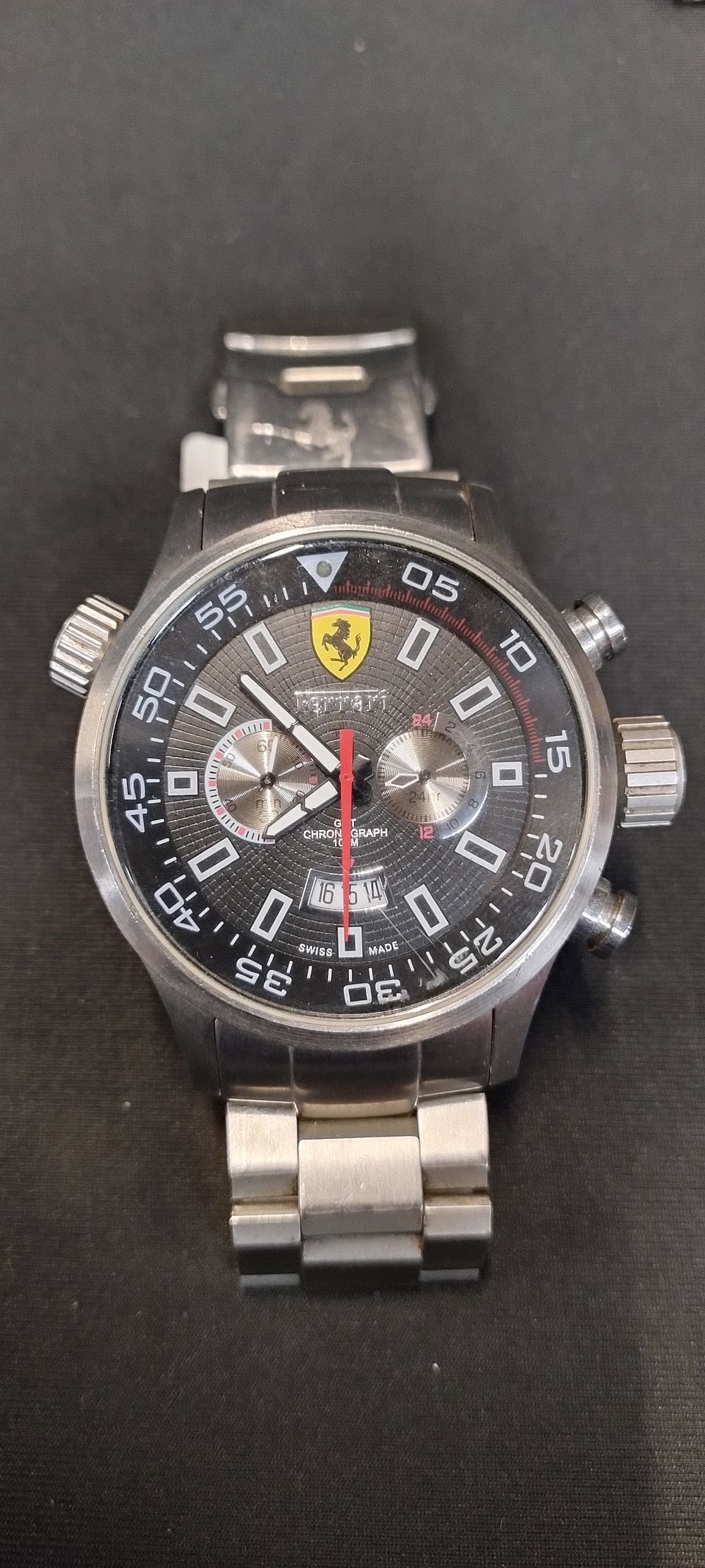 Lot 370: Mens Ferrari chronograph watch with Black,Red& White dial....