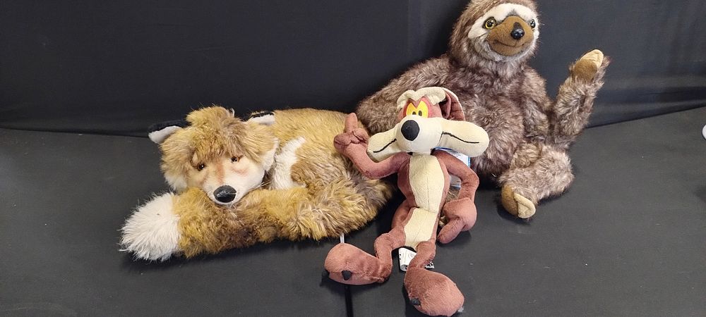 Lot 373: 3 Soft toys,Stieff fox, Sloth and Wile Coyote