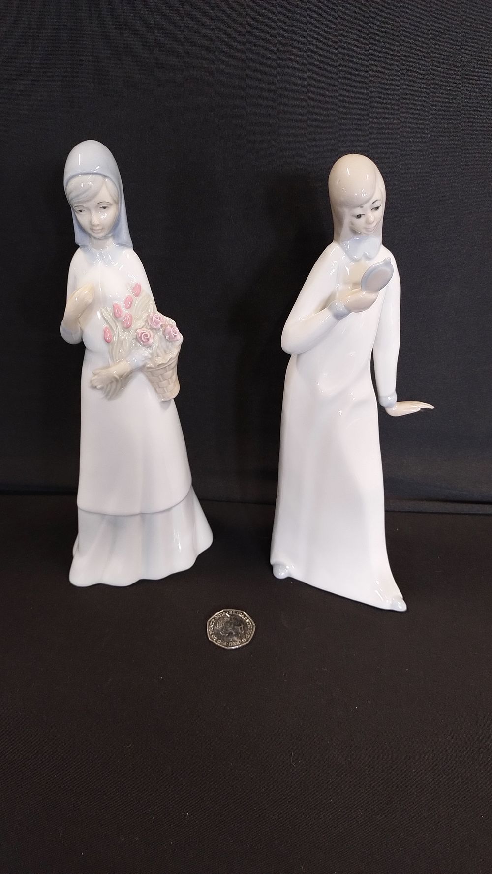 Lot 48: Vintage porcelain lady figurines made in Spain measures...