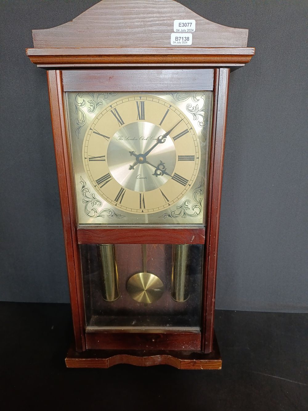 Lot 98: Vintage London Clock Company Quartz Wooden Wall Clock...