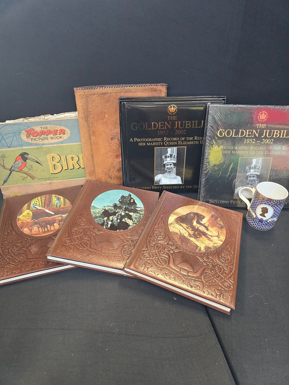 Lot 103: A collection of vintage books. Includes Three time.life...
