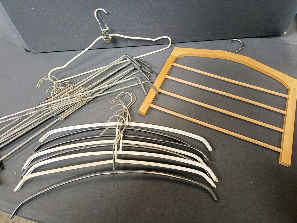 Lot 145: Selection of vintage coat/trousers hangers