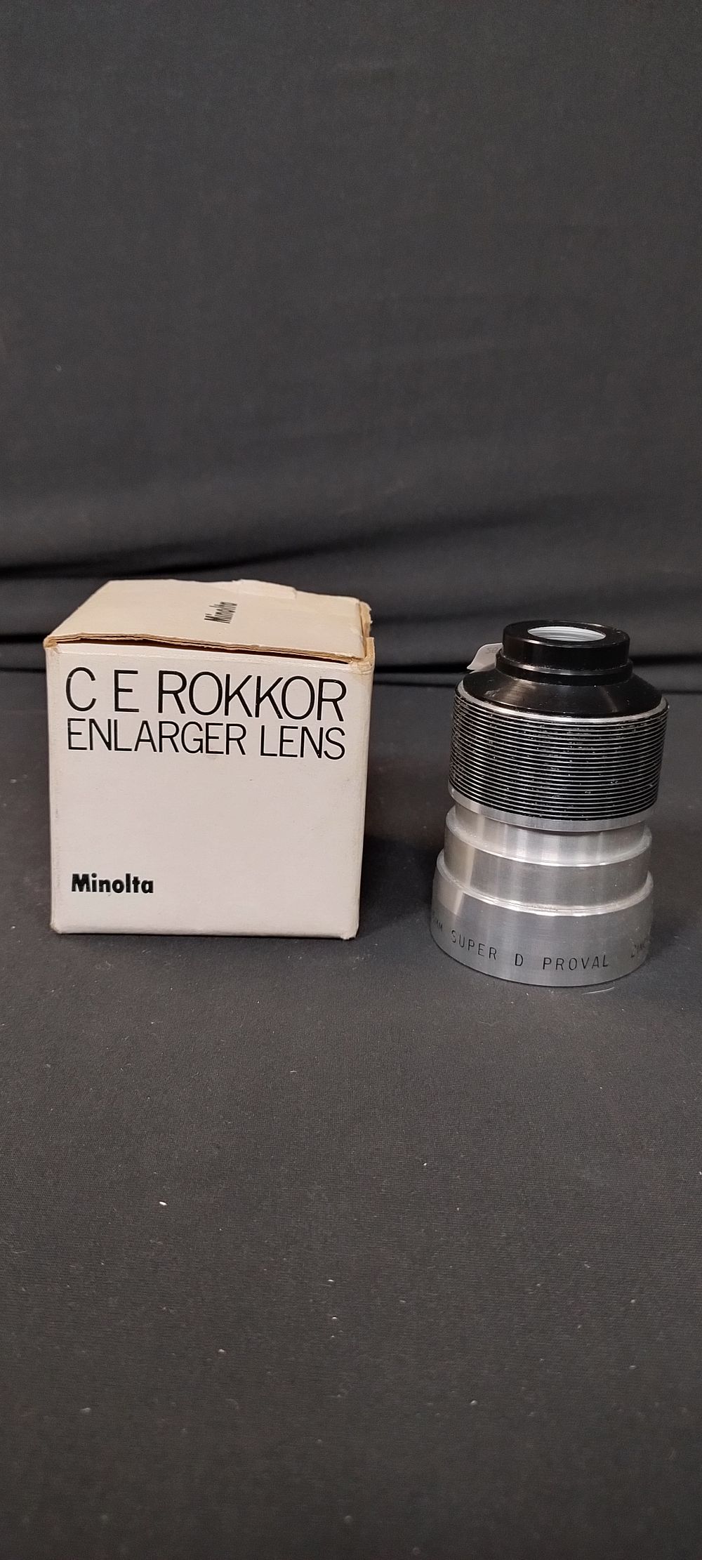 Lot 165: Two camera lenses, Minolta enlarger lens and a...
