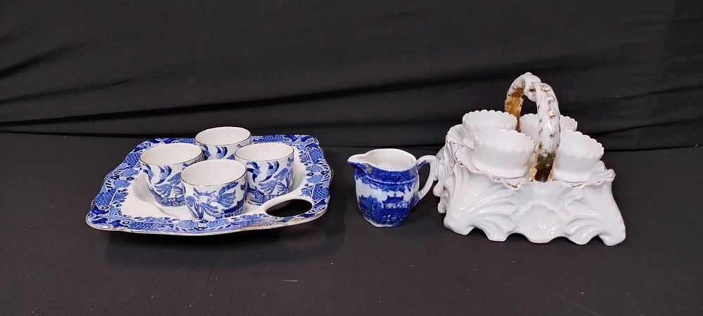 Lot 175: Burghley ware blue and white egg cruet set...