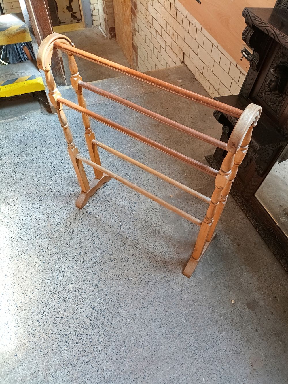 Lot 198: Antique towel rail, approximately 84cm tall
