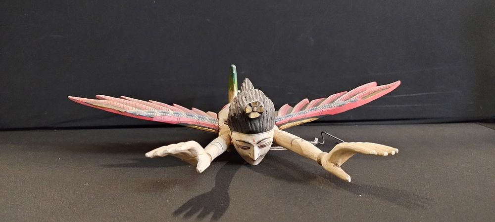Lot 286: Indonesian flying goddess measures approx L 30 x...