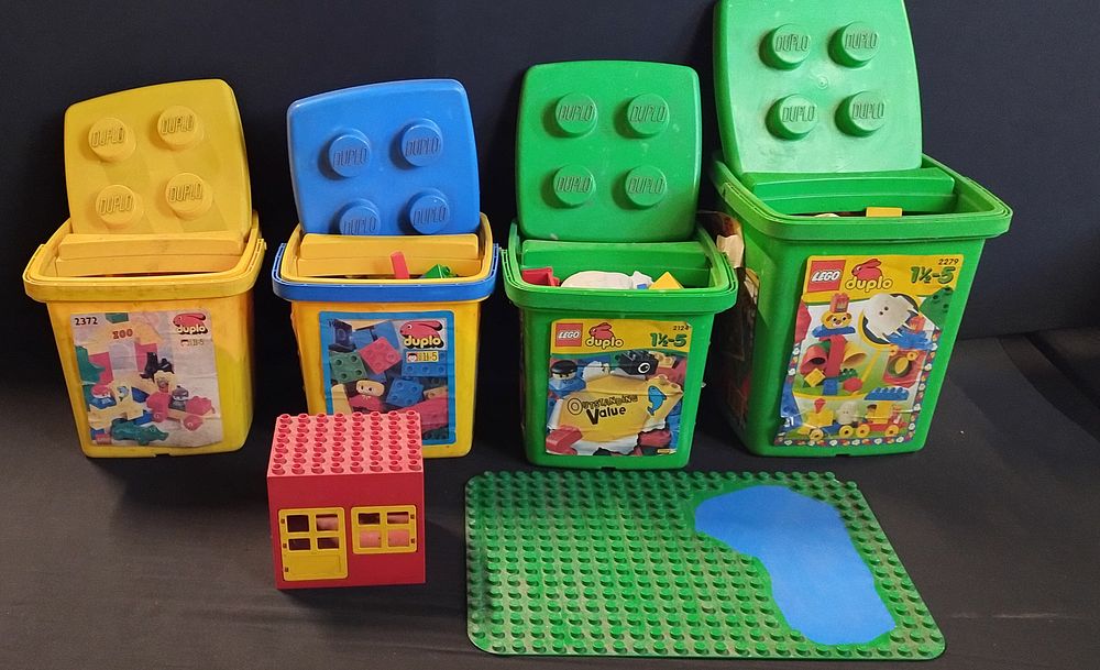 Lot 237: 4 tubs of Duplo bricks, vehicles and other...