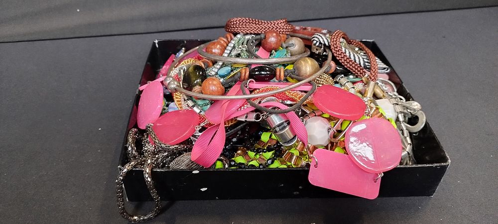 Lot 333: A quantity of costume jewellery. Including necklaces earrings...