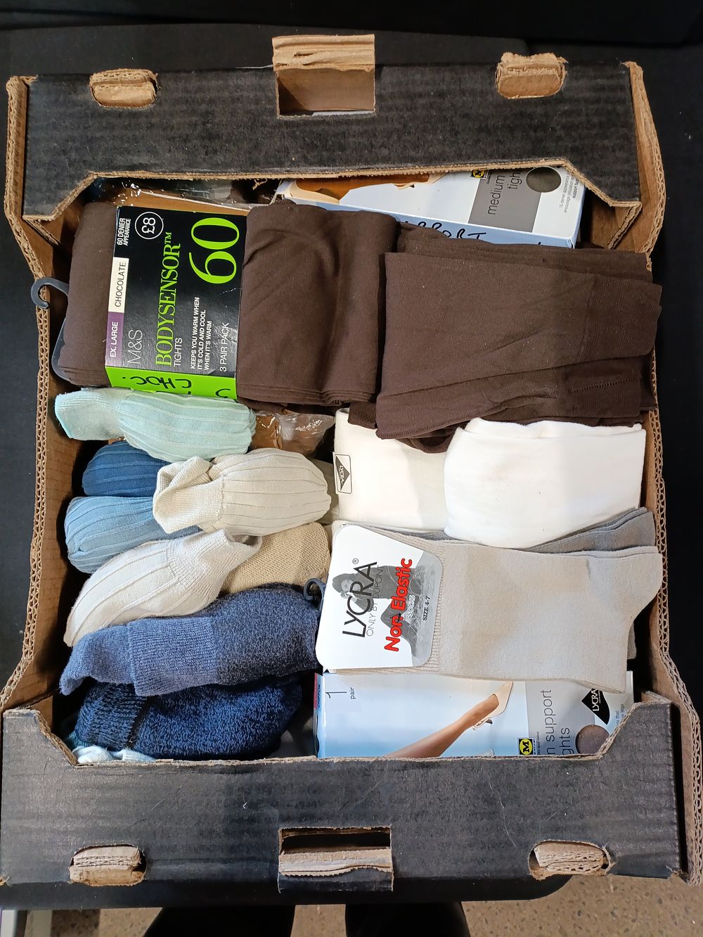 Lot 342: Assortment of mens and ladies socks as well...