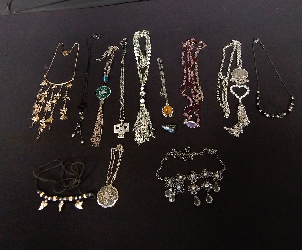 Lot 360:  Selection of costume jewellery necklaces including a sharks...